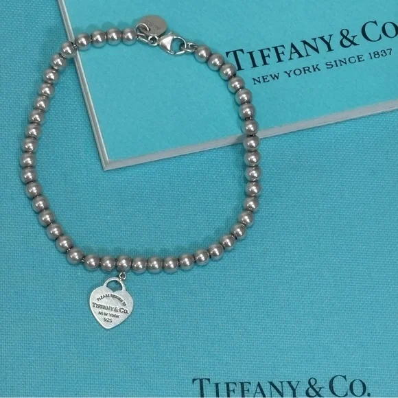Authentic Tiffany & Co 4mm Bead Bracelet w/ Silver Mini Heart Charm - Picture 3 of 10
